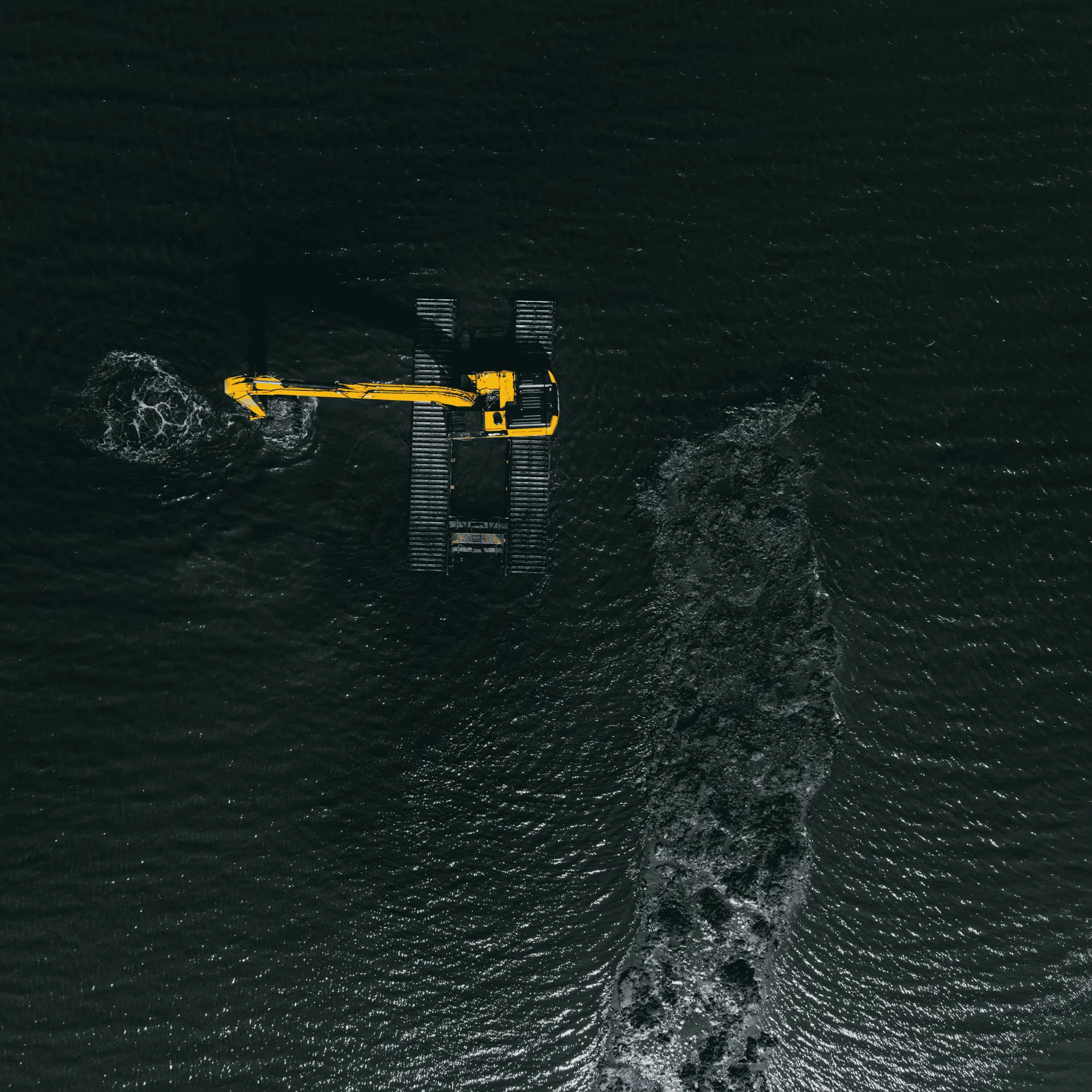 Excavators in the sea